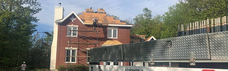 Déneigement de toiture - Construction Inc. Côte de Beaupré